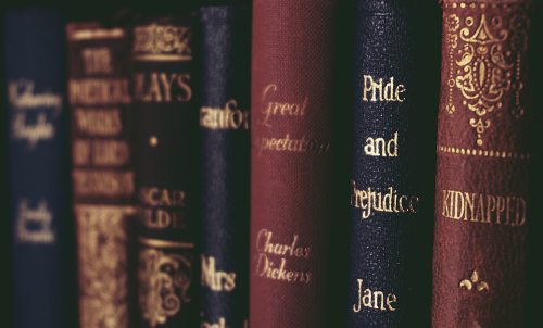 close-up-of-books-on-shelf-1560093